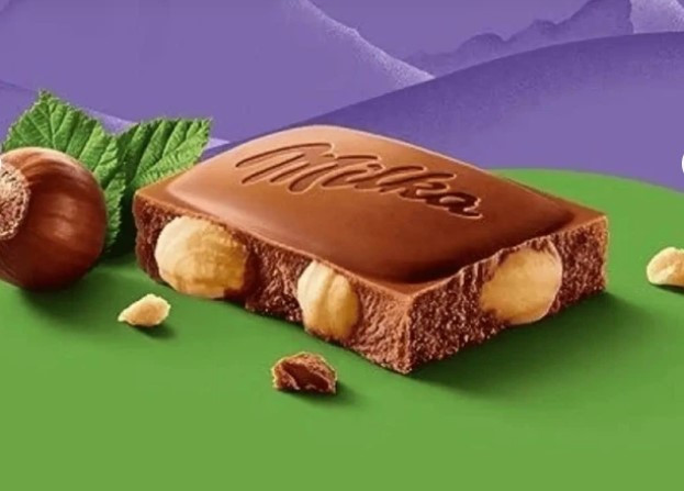 Шоколад Milka 250г Whole Hazelnuts з лісовими горіхами в коробці (1/12)